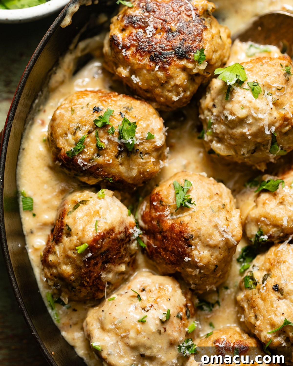 up close photo of chicken piccata meatballs.