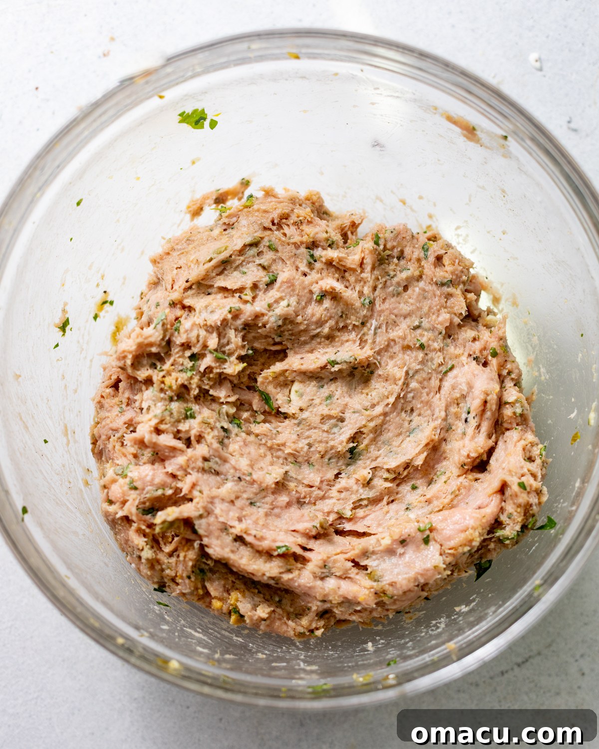 ground chicken meatball mixture in a bowl. 