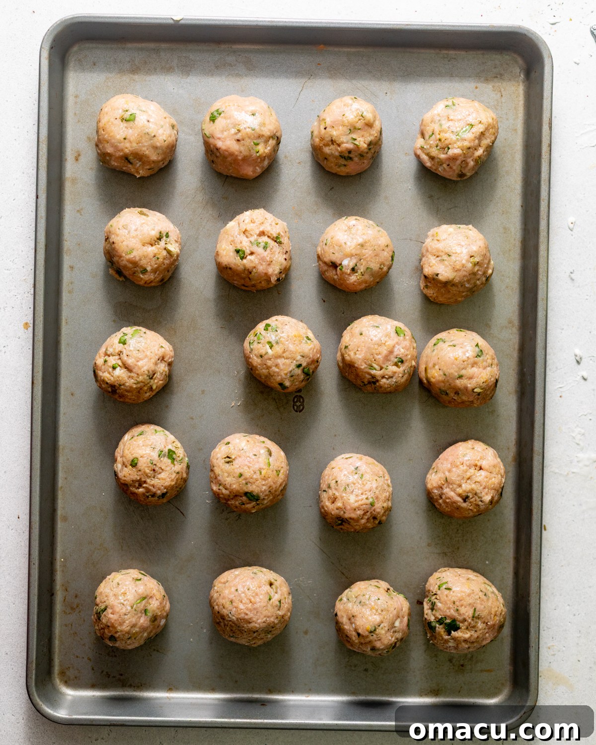 meatballs on a baking sheet.