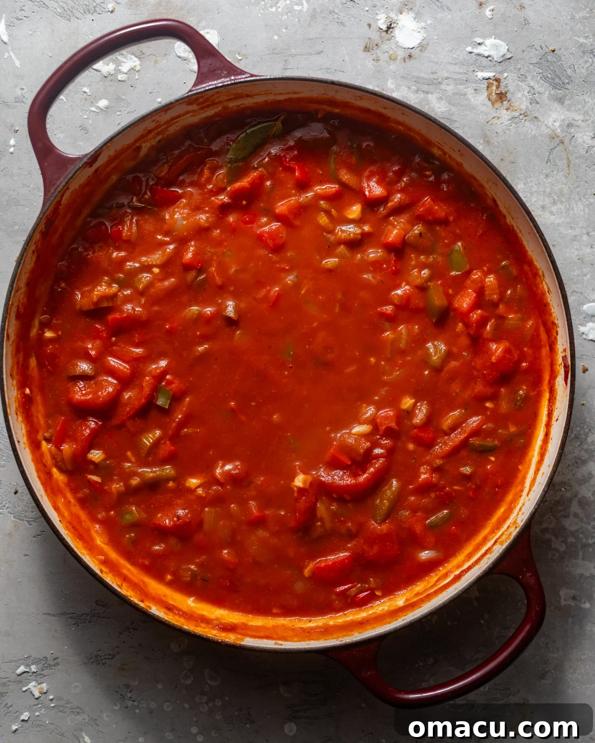 shrimp creole sauce in a skillet.