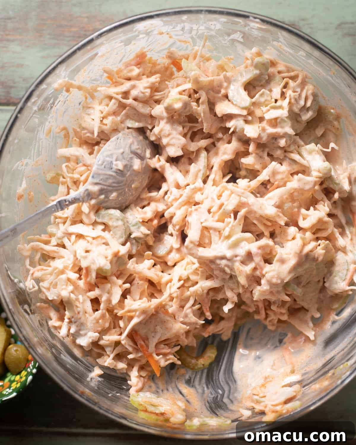 coleslaw mixed together in a bowl. 