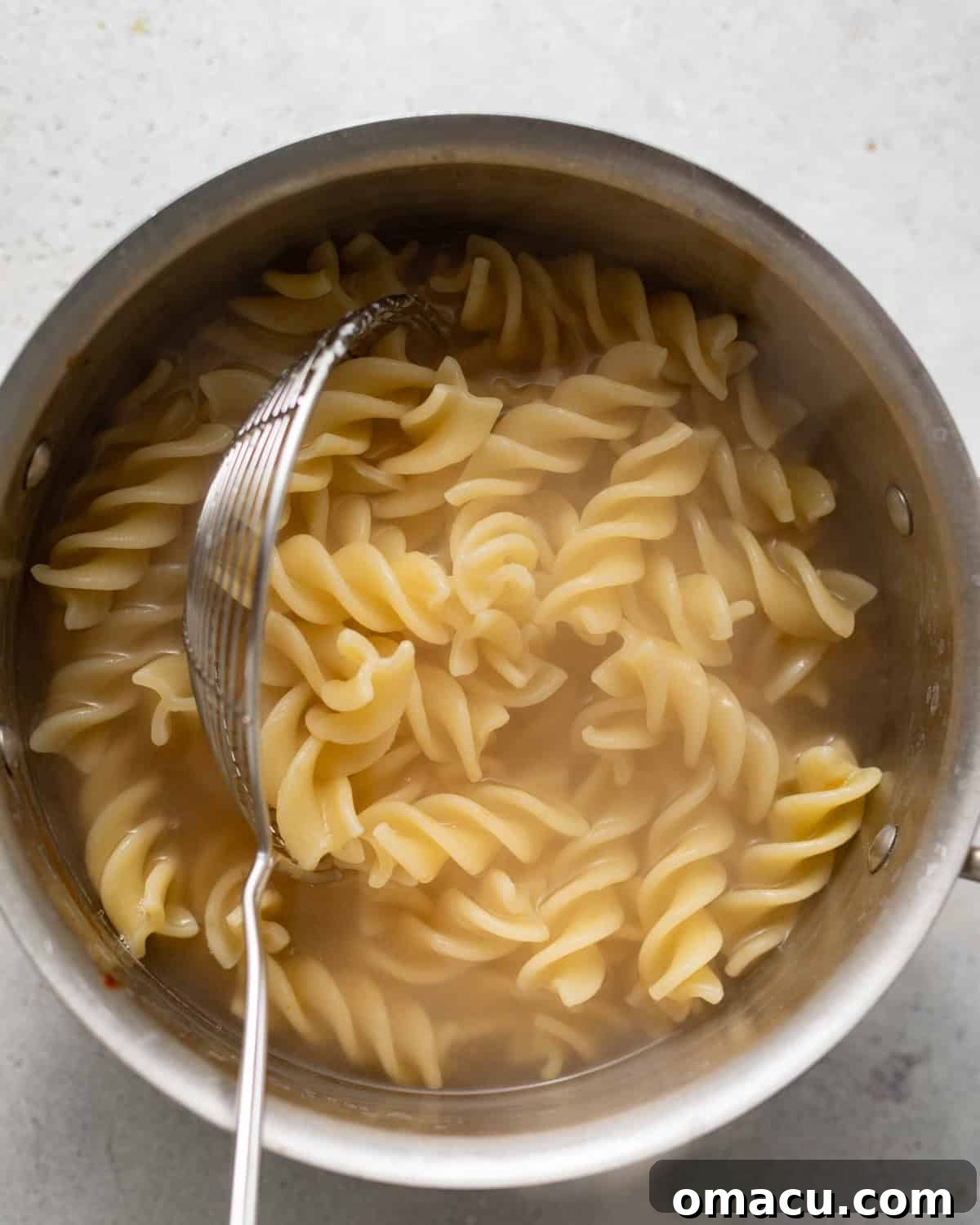 boiled pasta in a saucepan. 