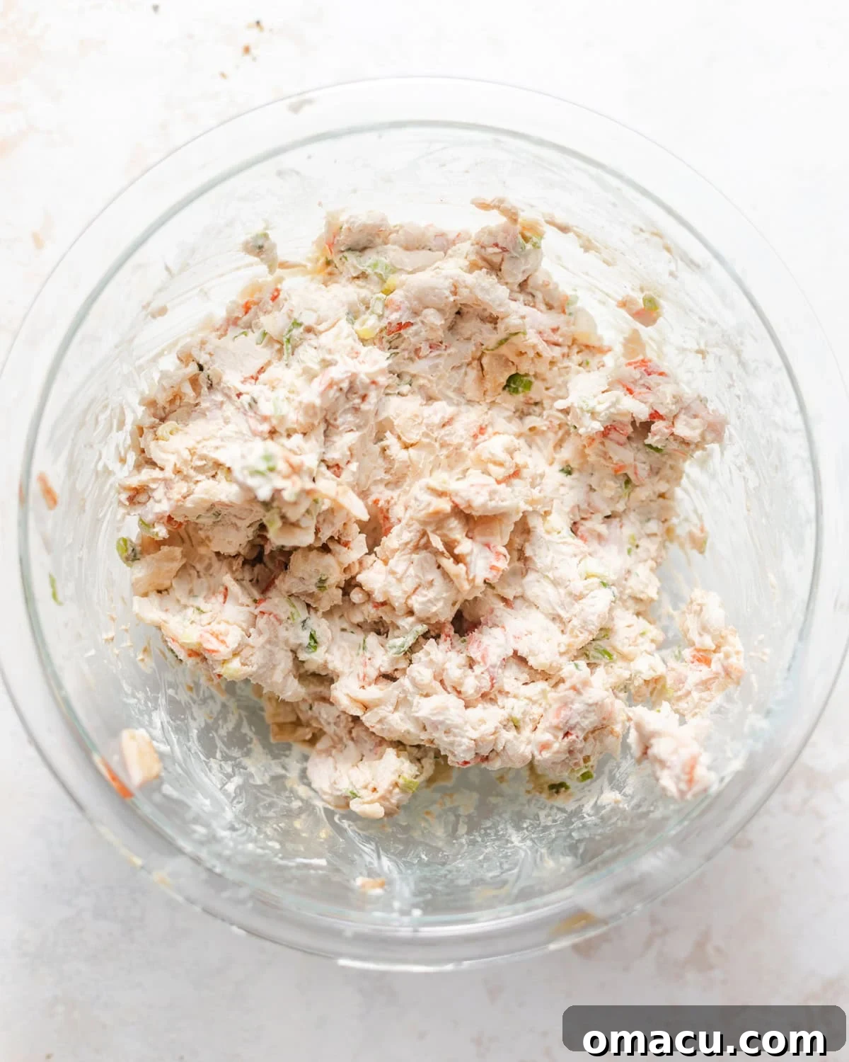 crab rangoon filling mixed together in a bowl. 