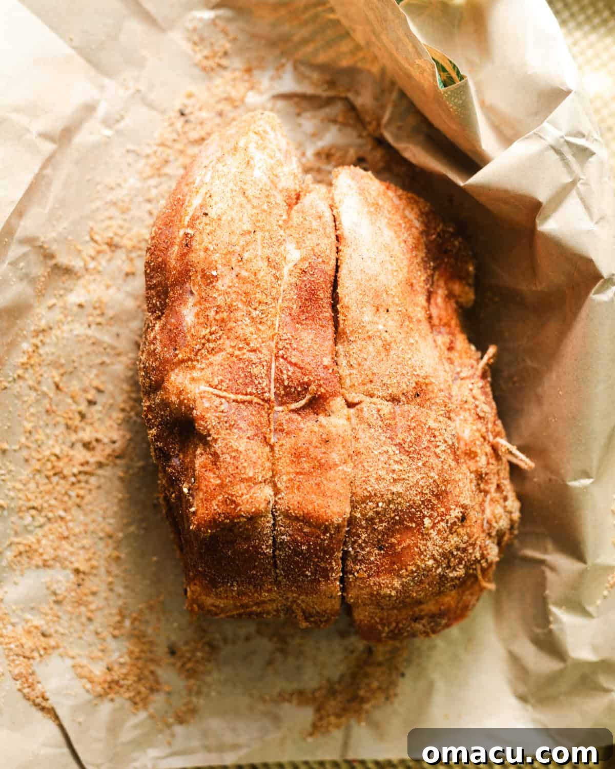 pork roast covered in seasoning.