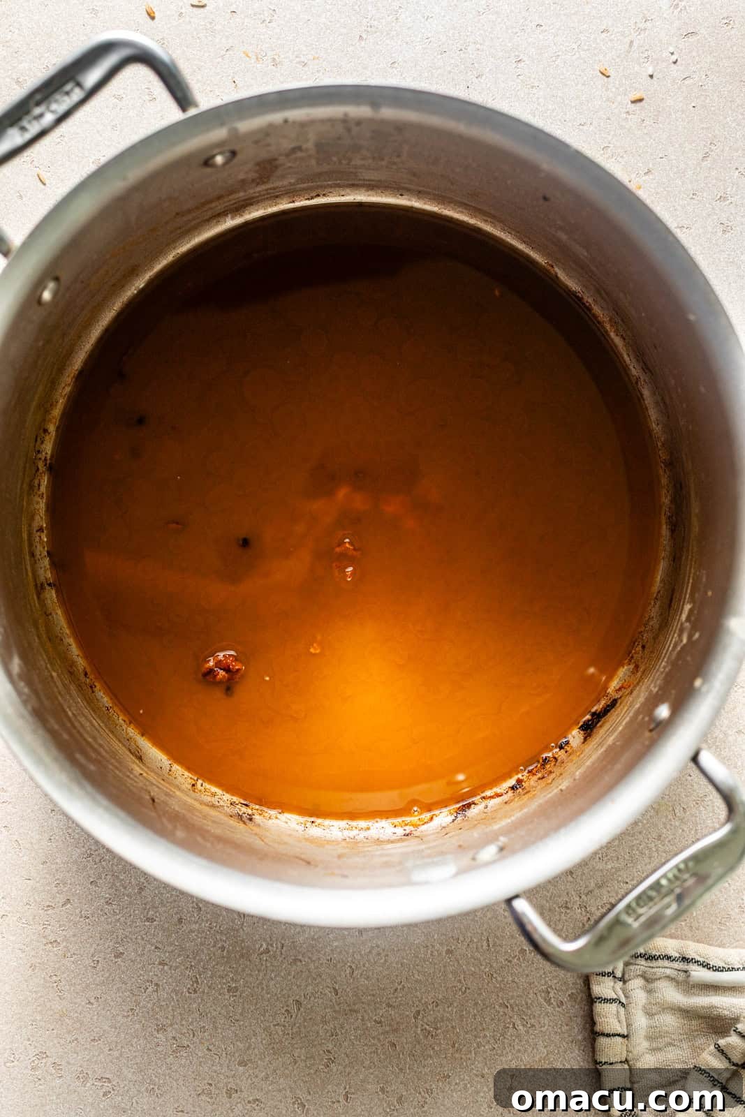 dark brown roux in a pot. 