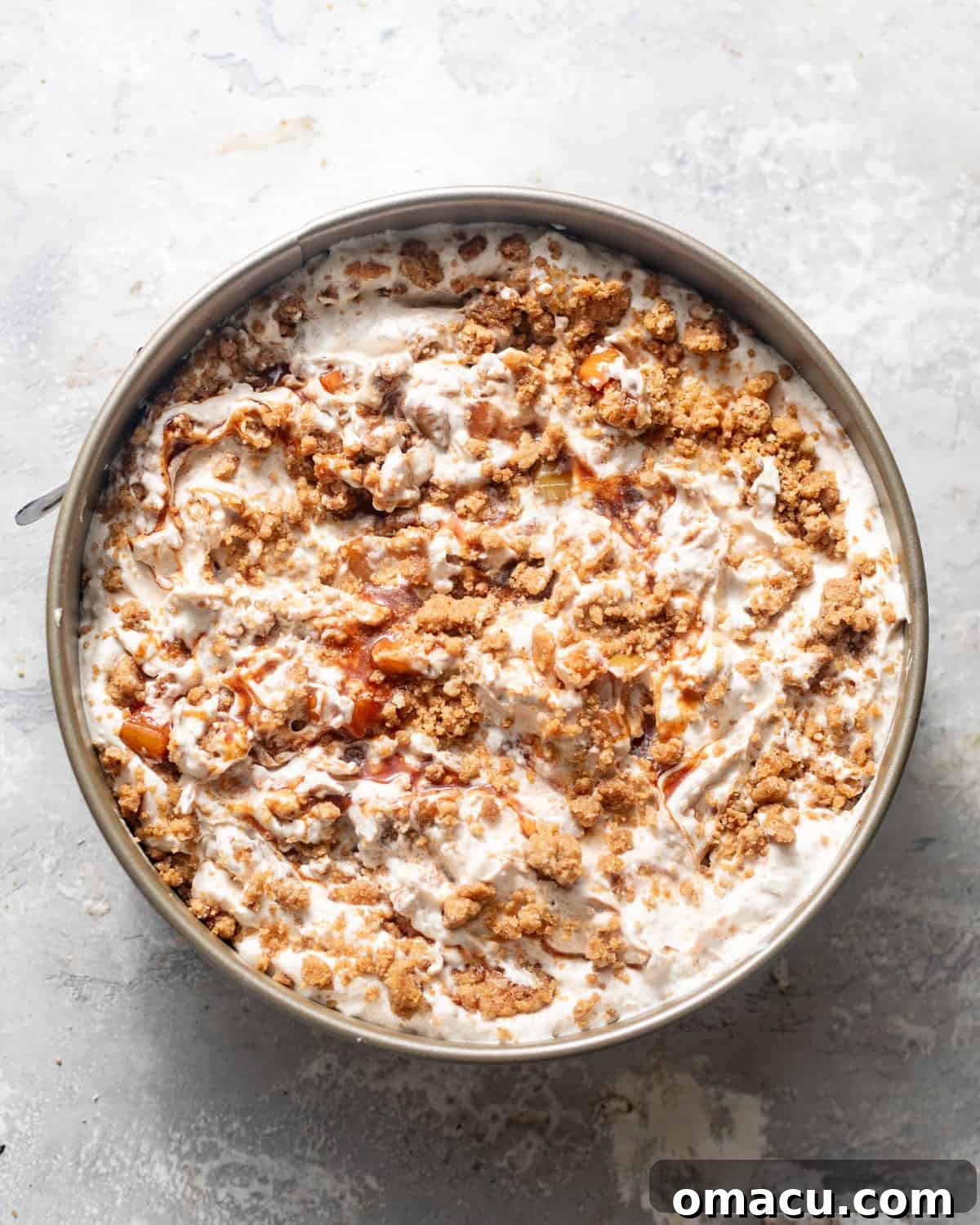 apple pie ice cream assembled in a springform pan.