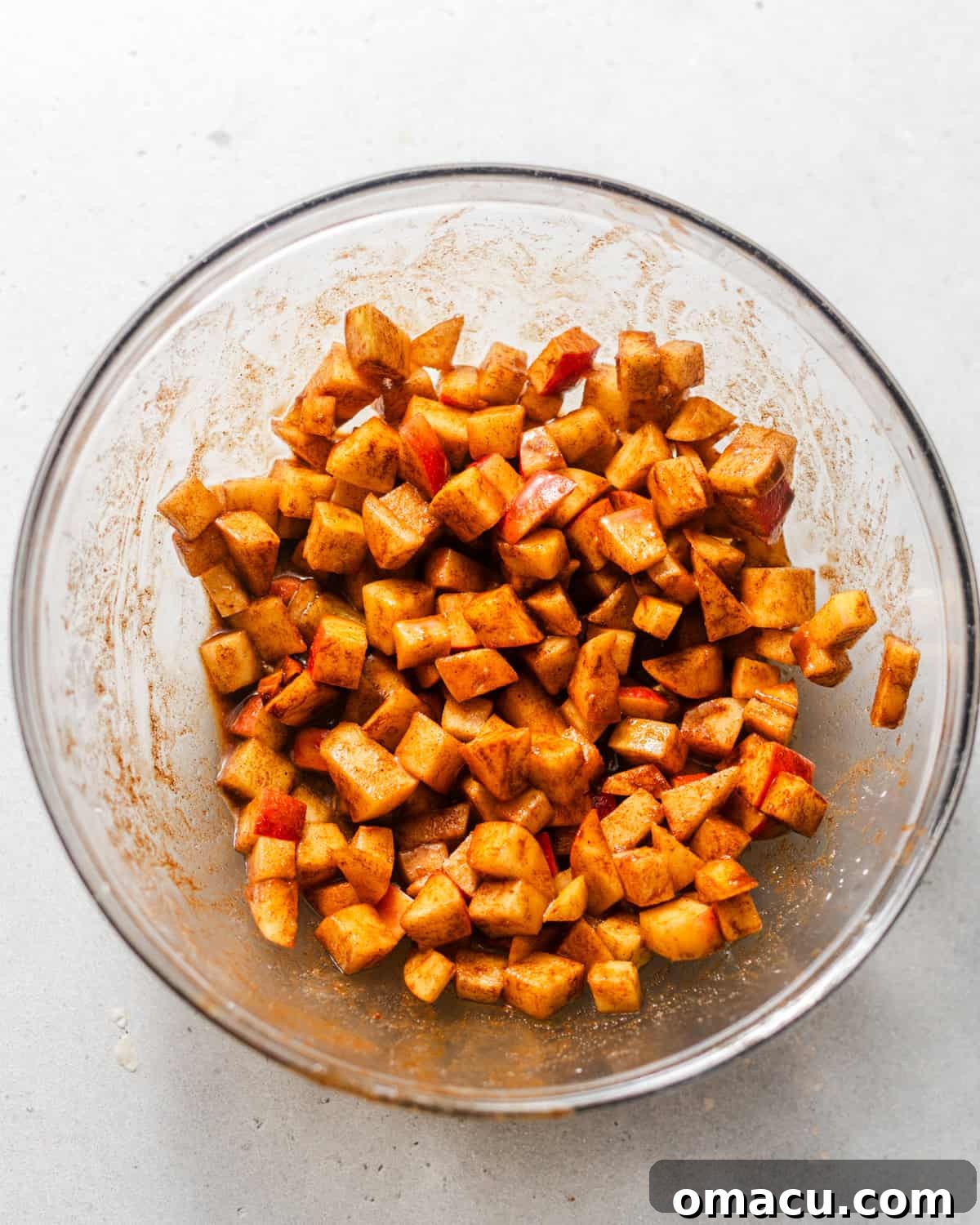 Chopped Honeycrisp apples tossed with brown sugar, cinnamon, and cornstarch.