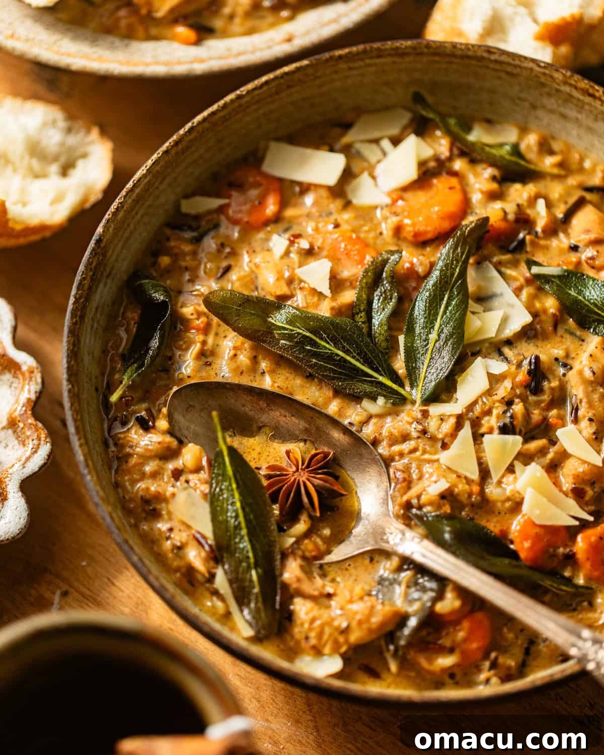 up close photo of chicken wild rice soup in a bowl. 