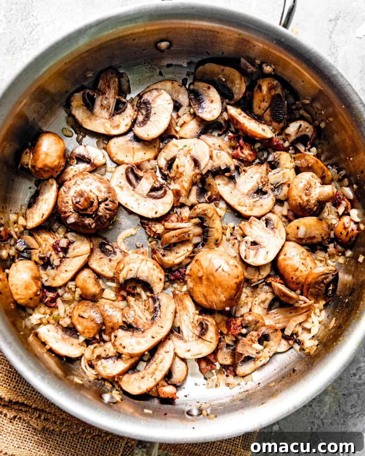 sauteed mushrooms, onions, and garlic in a pan. 