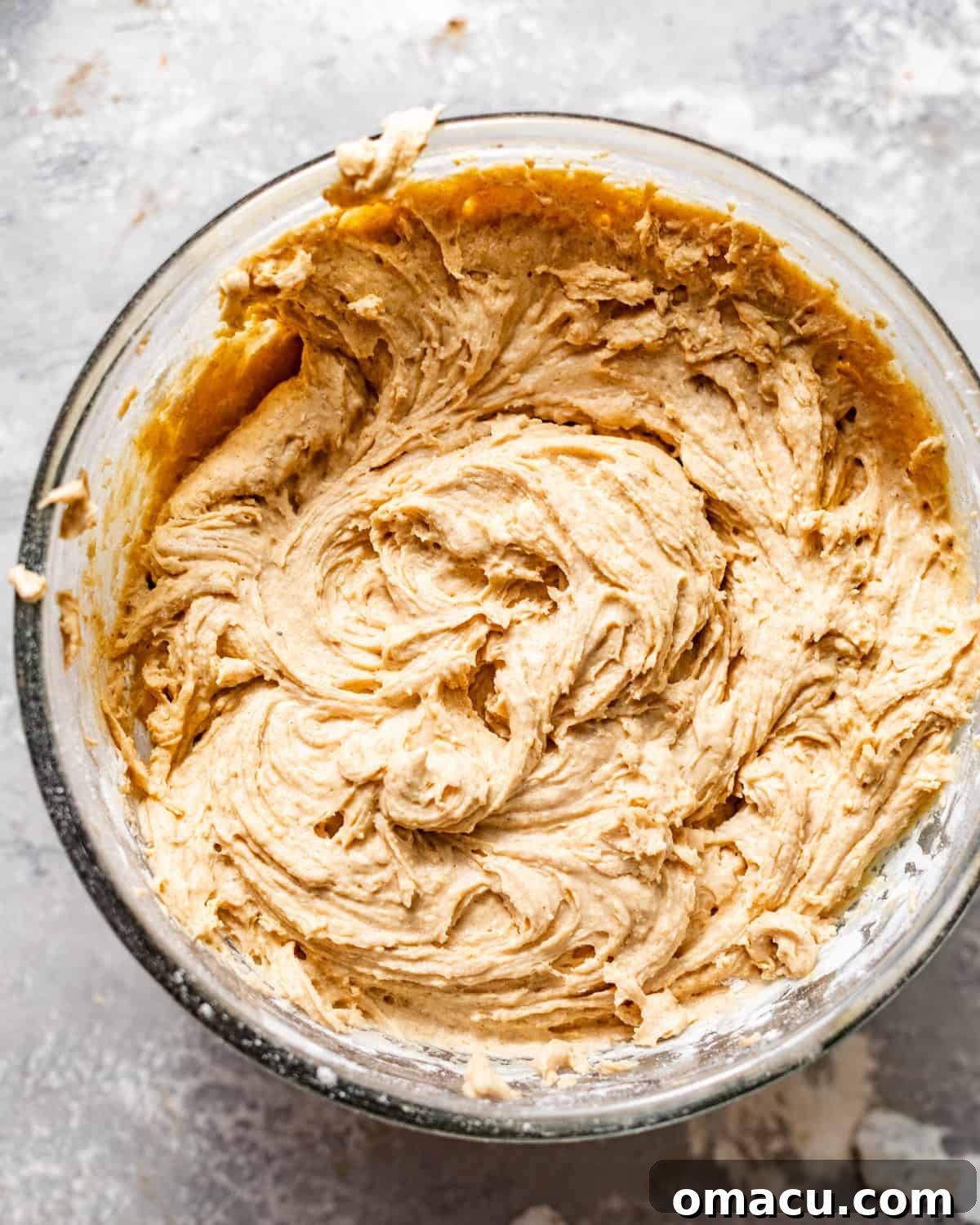 apple cider whoopie pie batter in a bowl. 