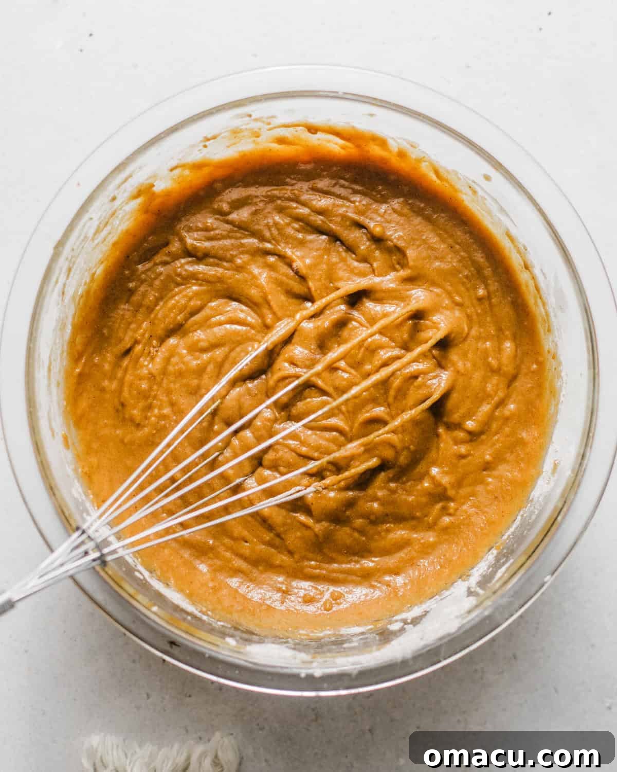 wet ingredients whisked together in a bowl. 