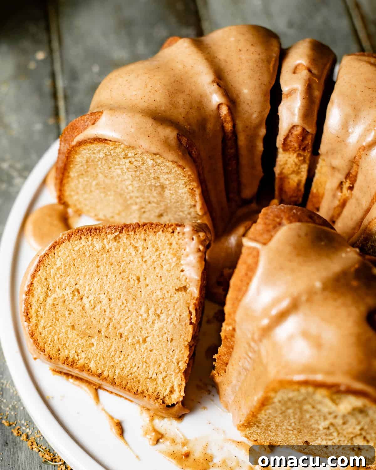 A close-up of a sliced brown sugar pound cake, revealing its moist, tender crumb and inviting caramel hue.