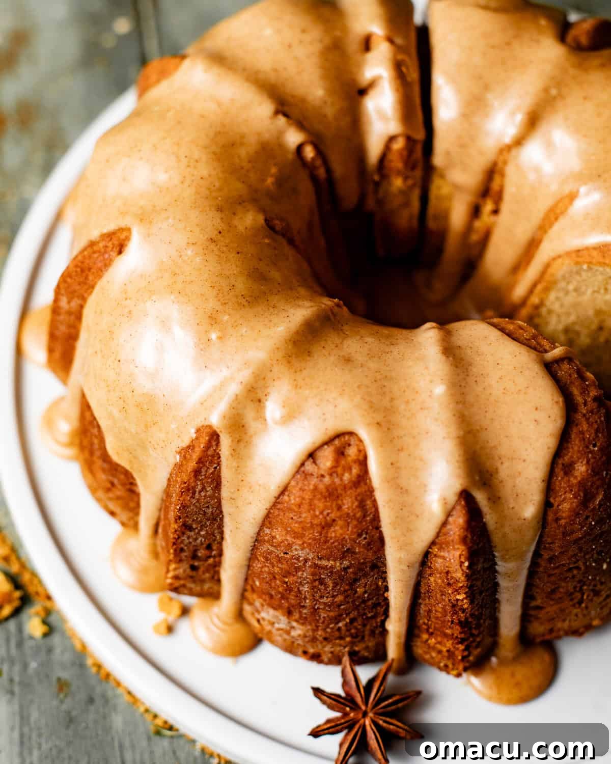 Overhead shot of a beautifully presented brown sugar pound cake on a white plate, ready to be enjoyed.