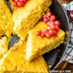 sliced cornbread in a skillet