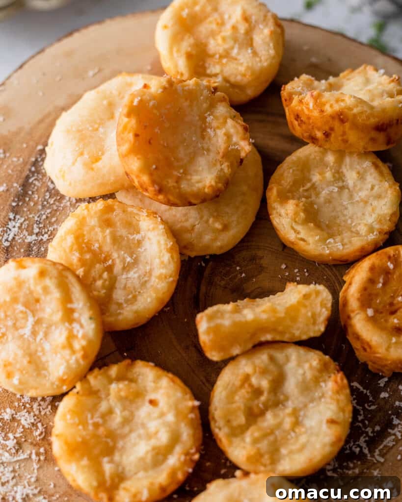 Pao De Queijo on a wooden cheese board