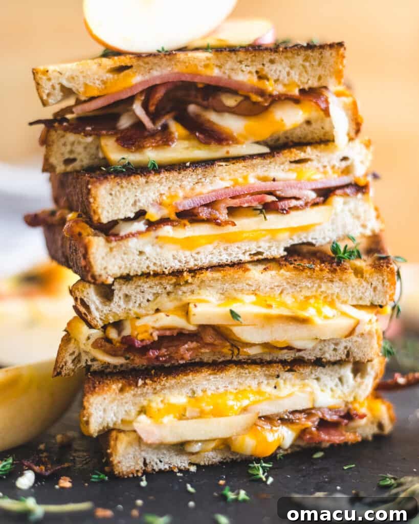 The finished Apple Bacon Cheddar Grilled Cheese, ready to be served and savored.