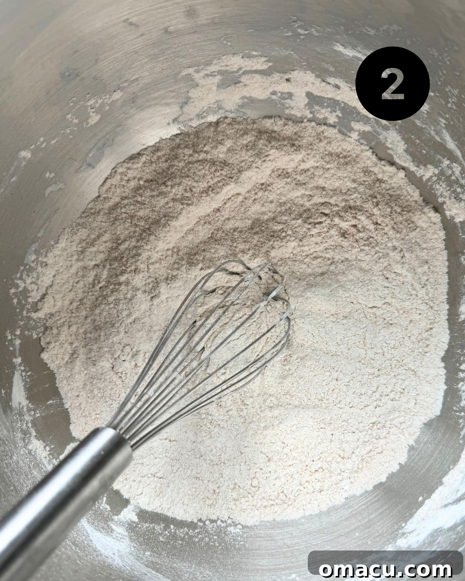 A mix of bread flour and all-purpose flour in a large mixing bowl, ready for dough preparation.