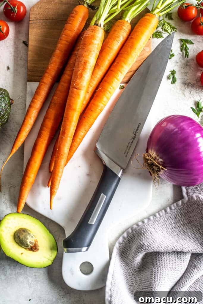 Julienned carrots presented on a cutting board, ready for use