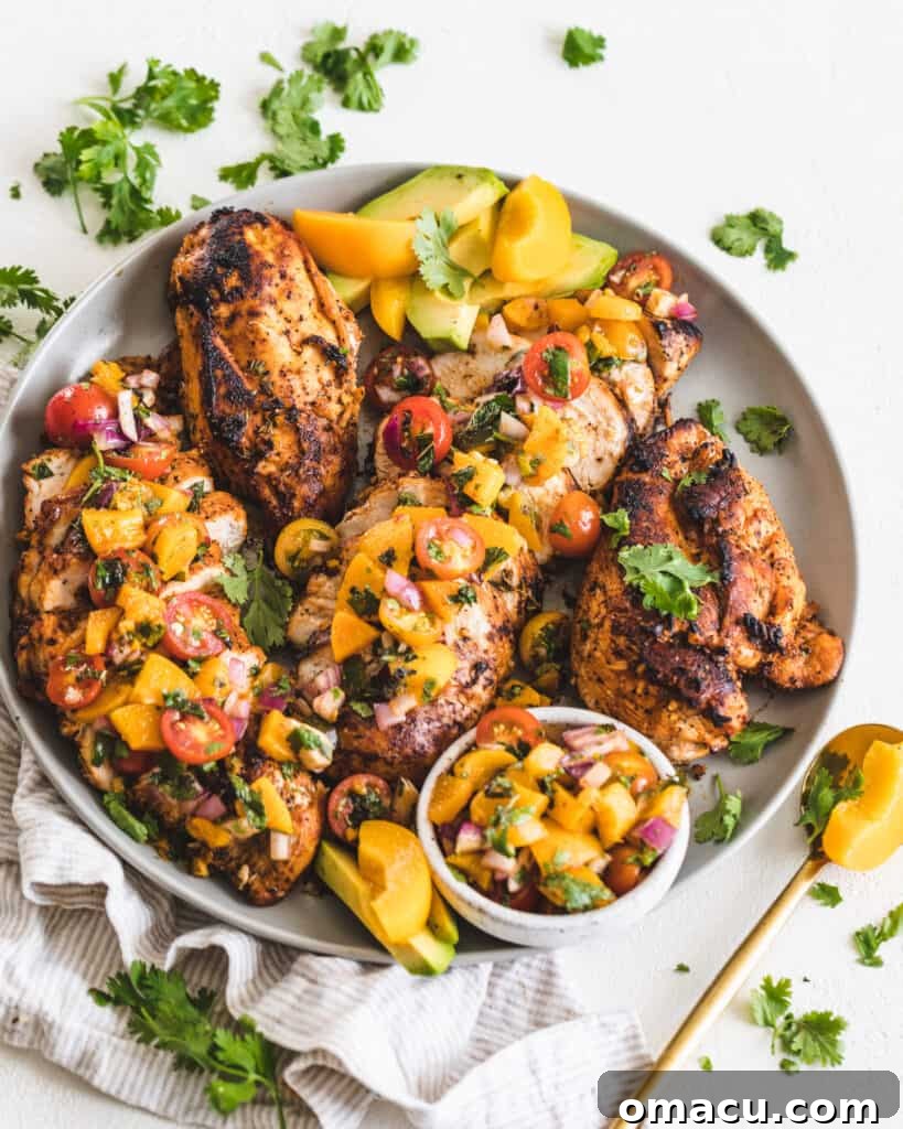 Overhead shot of Honey Garlic Chicken with peach salsa, highlighting the vibrant colors