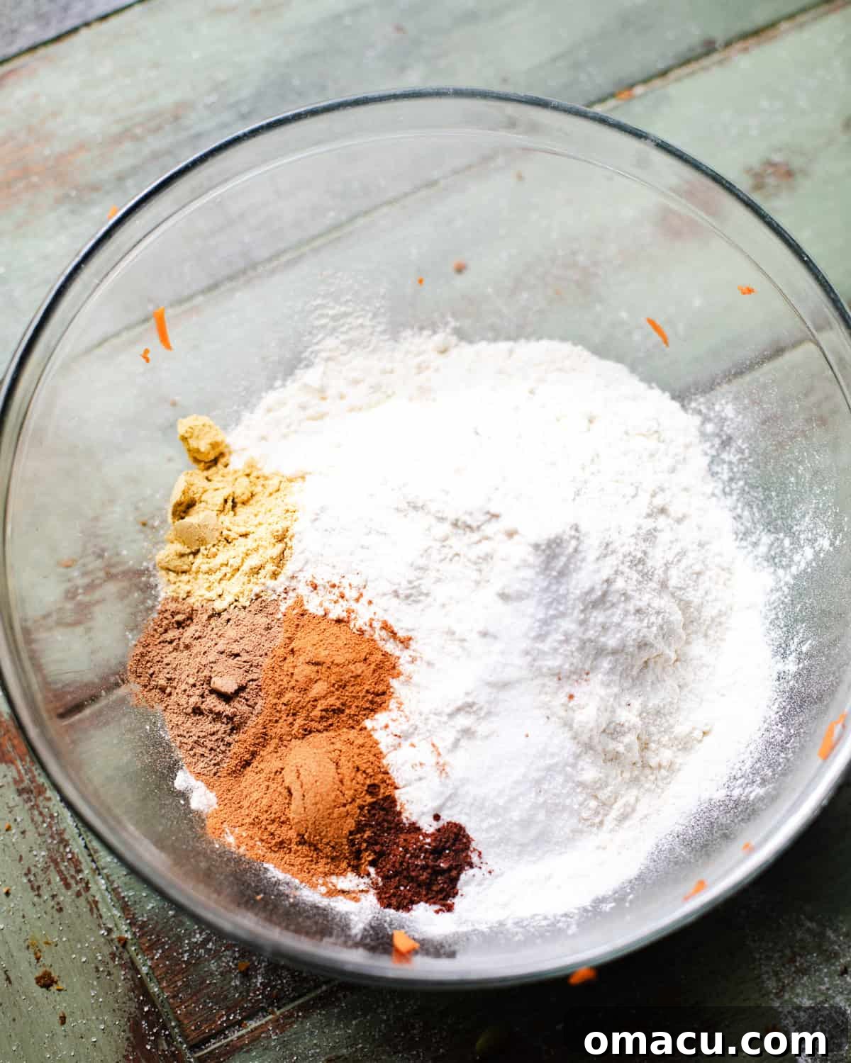 Dry ingredients whisked together in a bowl.