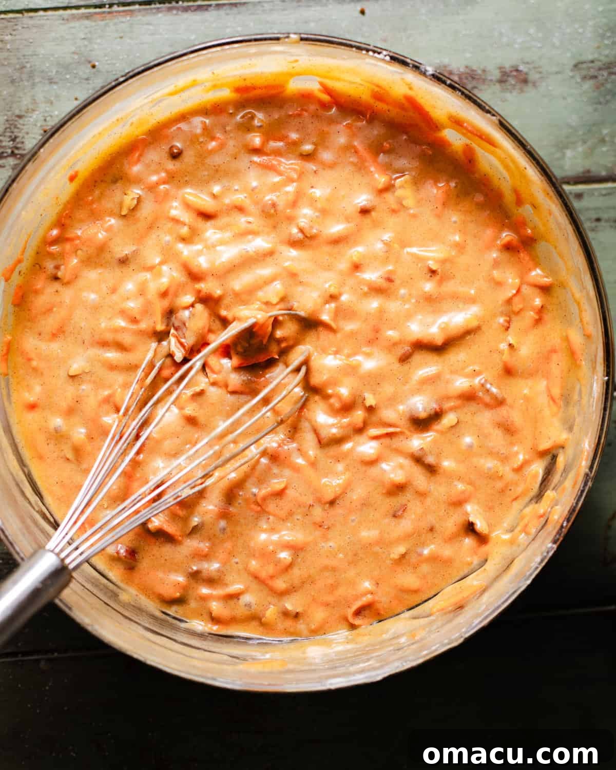 Carrot cake batter in a bowl.