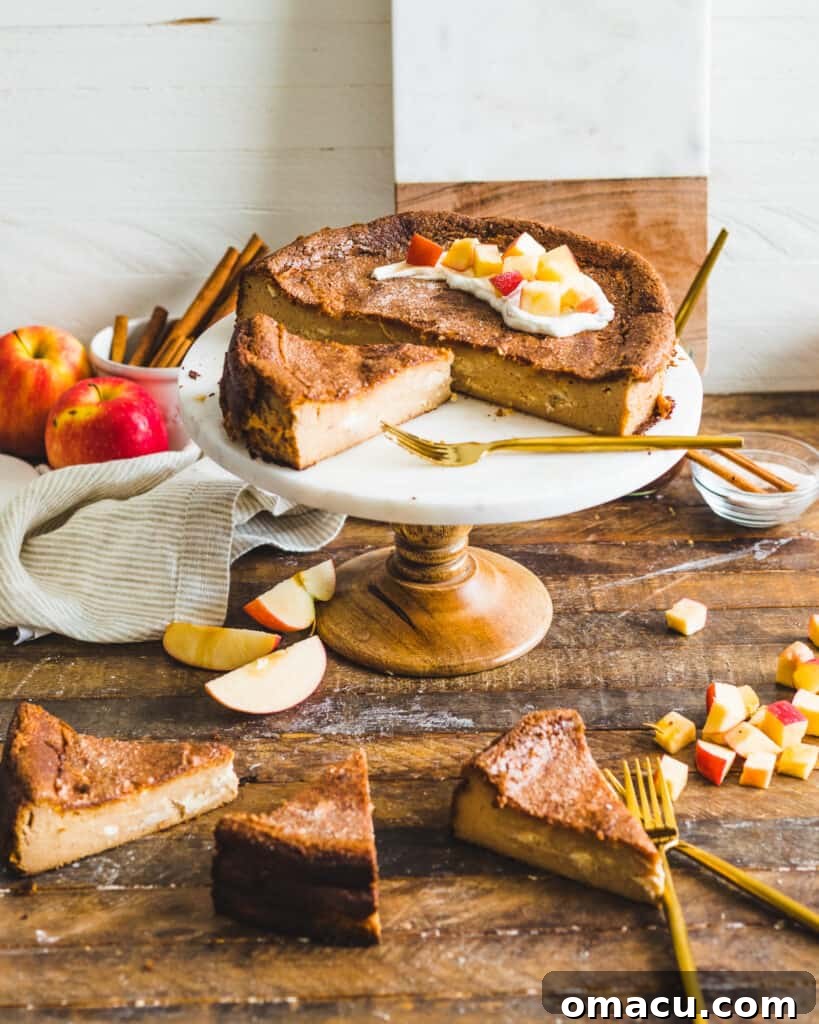 A beautifully presented Apple Butter Basque Cheesecake, with individual slices ready for serving, highlighting its signature 'burnt' top and smooth texture.