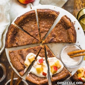 Overhead view of sliced Apple Butter Basque Cheesecake, ready to be served.