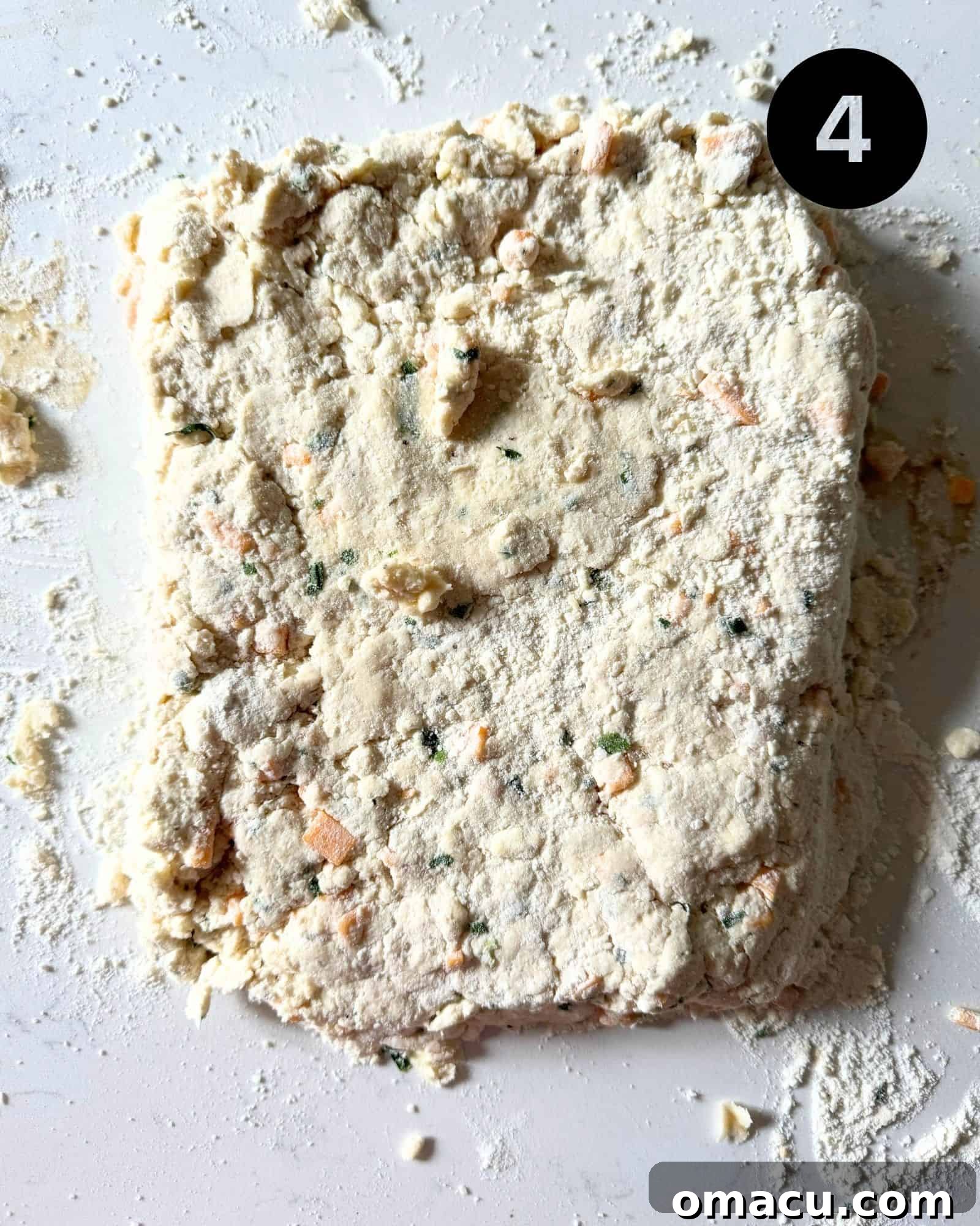 biscuit dough on a well floured work surface.