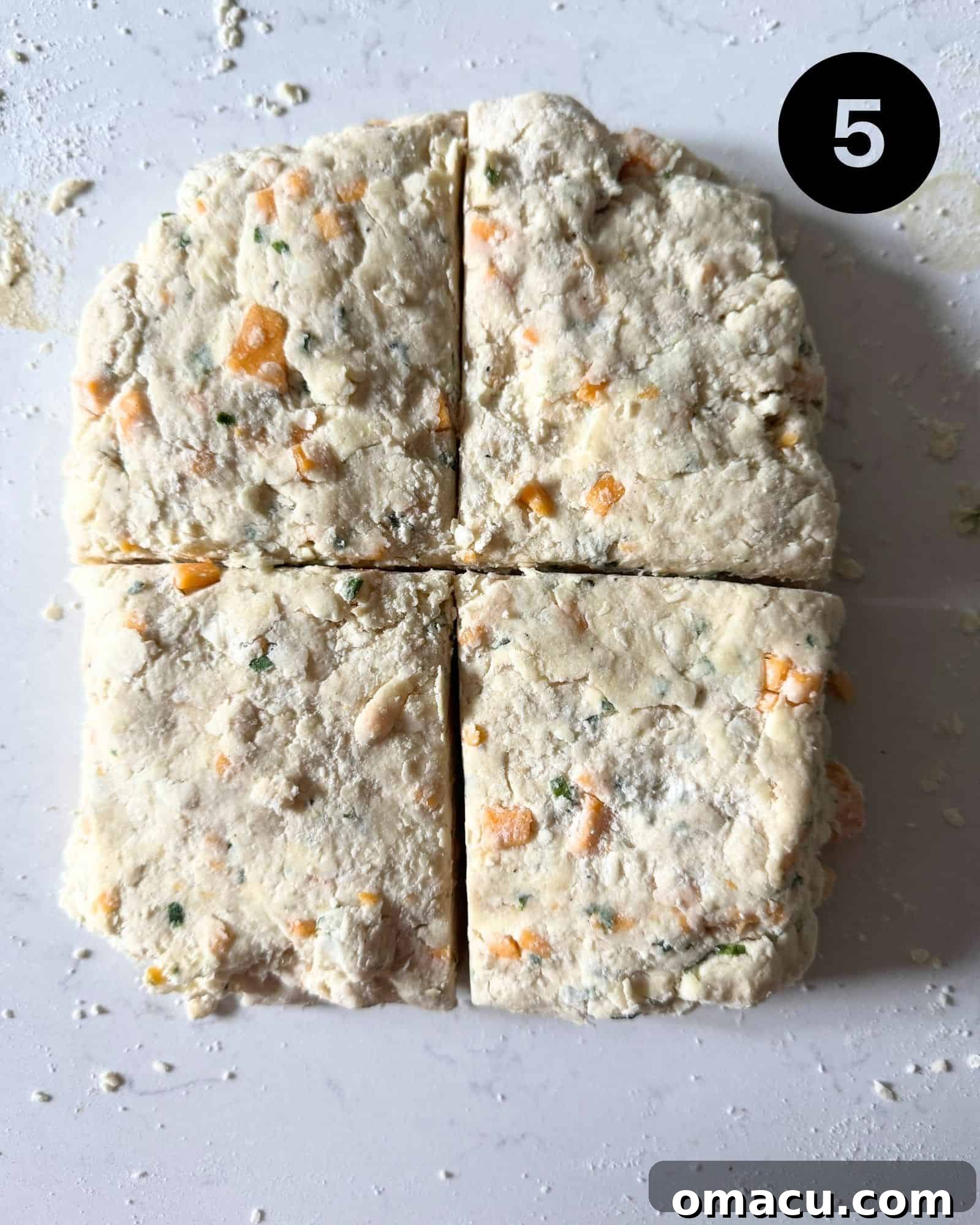biscuit dough cut into four pieces.