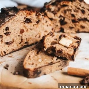 A loaf of freshly baked cinnamon raisin sourdough bread.
