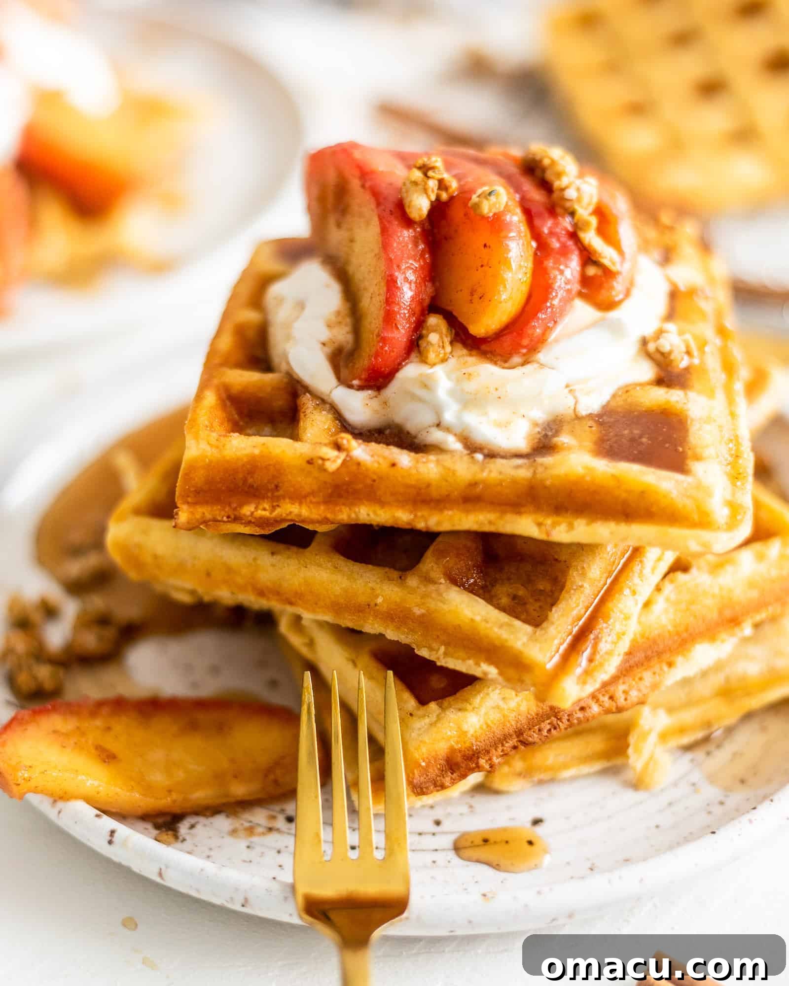 Up close shot of waffles with cinnamon apples