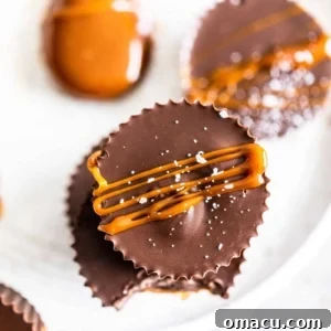 A beautifully composed shot of the finished salted caramel peanut butter cups, perfectly arranged and ready to be served.