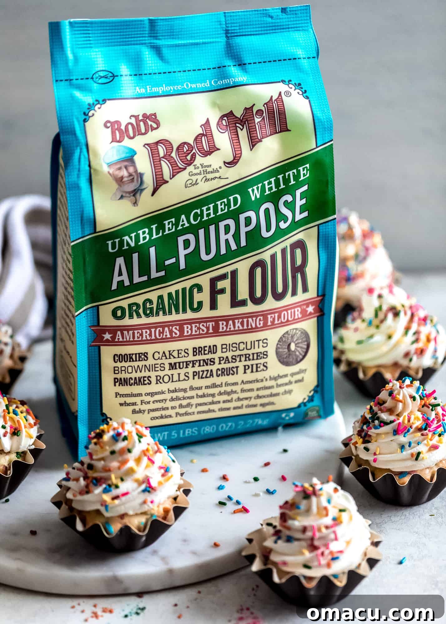 Ingredients for baking, including Bob's Red Mill Flour, hinting at the quality used in our Funfetti Cupcakes.