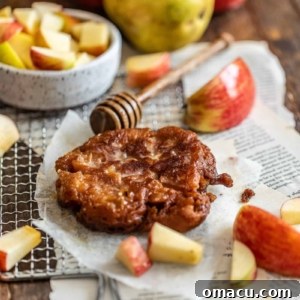 Photo of apple pear fritter on a piece of parchment paper