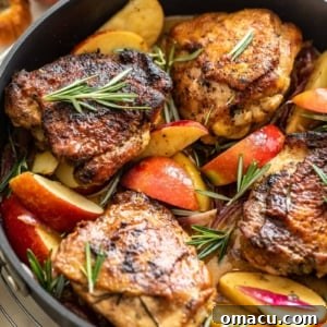 rosemary apple cider chicken in a pan, styled for a recipe card