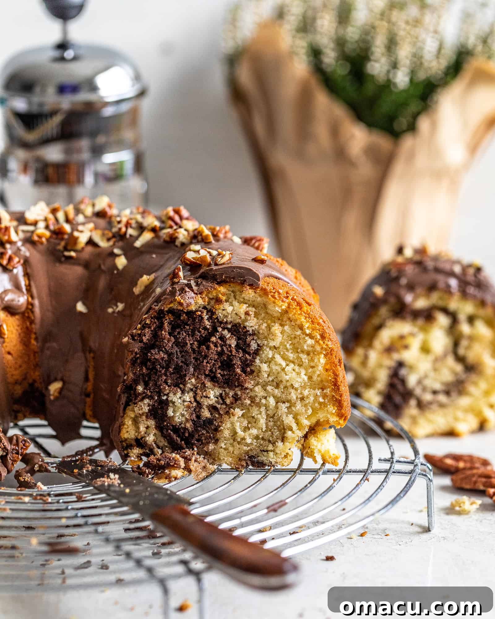 An appetizing inside shot of the chocolate coffee marble cake, highlighting the distinct layers and swirls of coffee, chocolate, and vanilla batter.