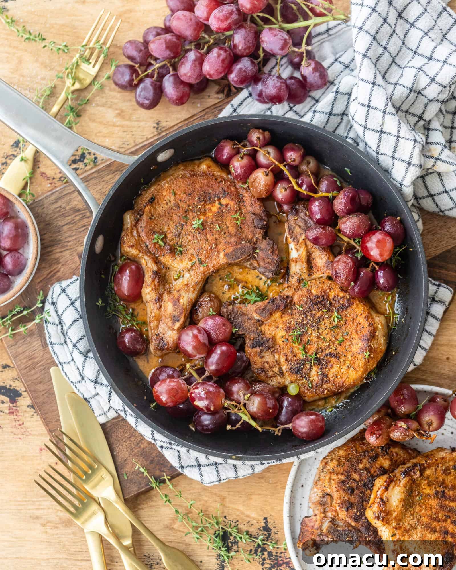 Ingredients for Garlic Rosemary Pork Chops and Roasted Grapes laid out.