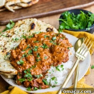 Finished Butter Chicken with Naan, ready to serve