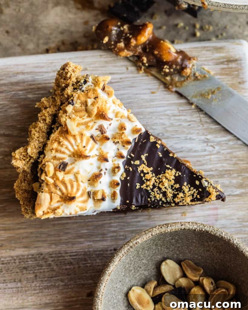 A single slice of chocolate tart being served with a butter knife, showcasing the perfect consistency of its layers.