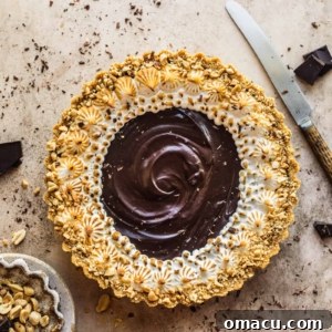 Salted caramel chocolate tart with on a table