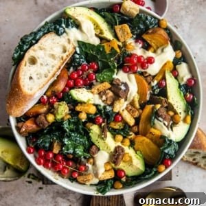 vegan kale caesar salad in a bowl with bread