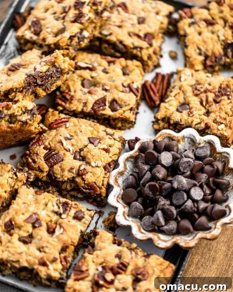 Perfectly cut cookie bars arranged neatly on a baking sheet, ready to be served.