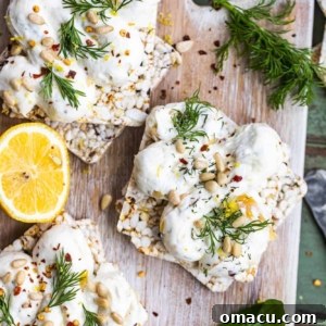 Roasted Garlic Labneh on a serving board with crackers