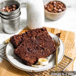 Two slices of chocolate banana bread on a plate