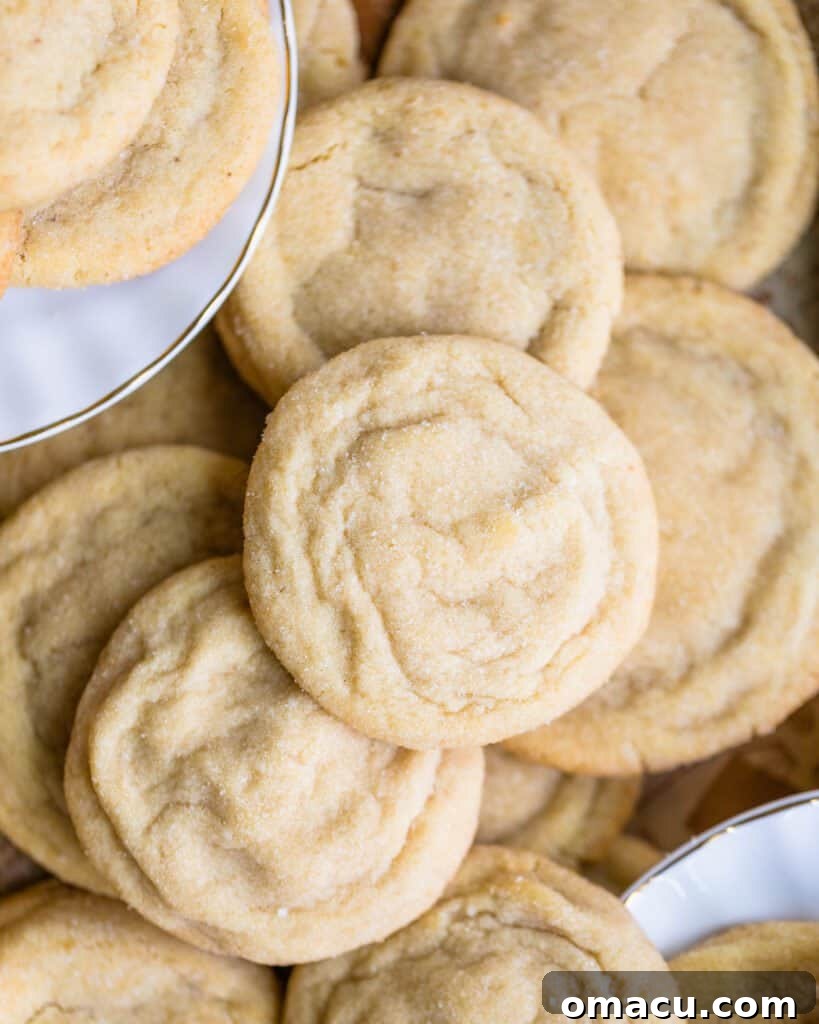 A stack of golden-brown butter sugar cookies