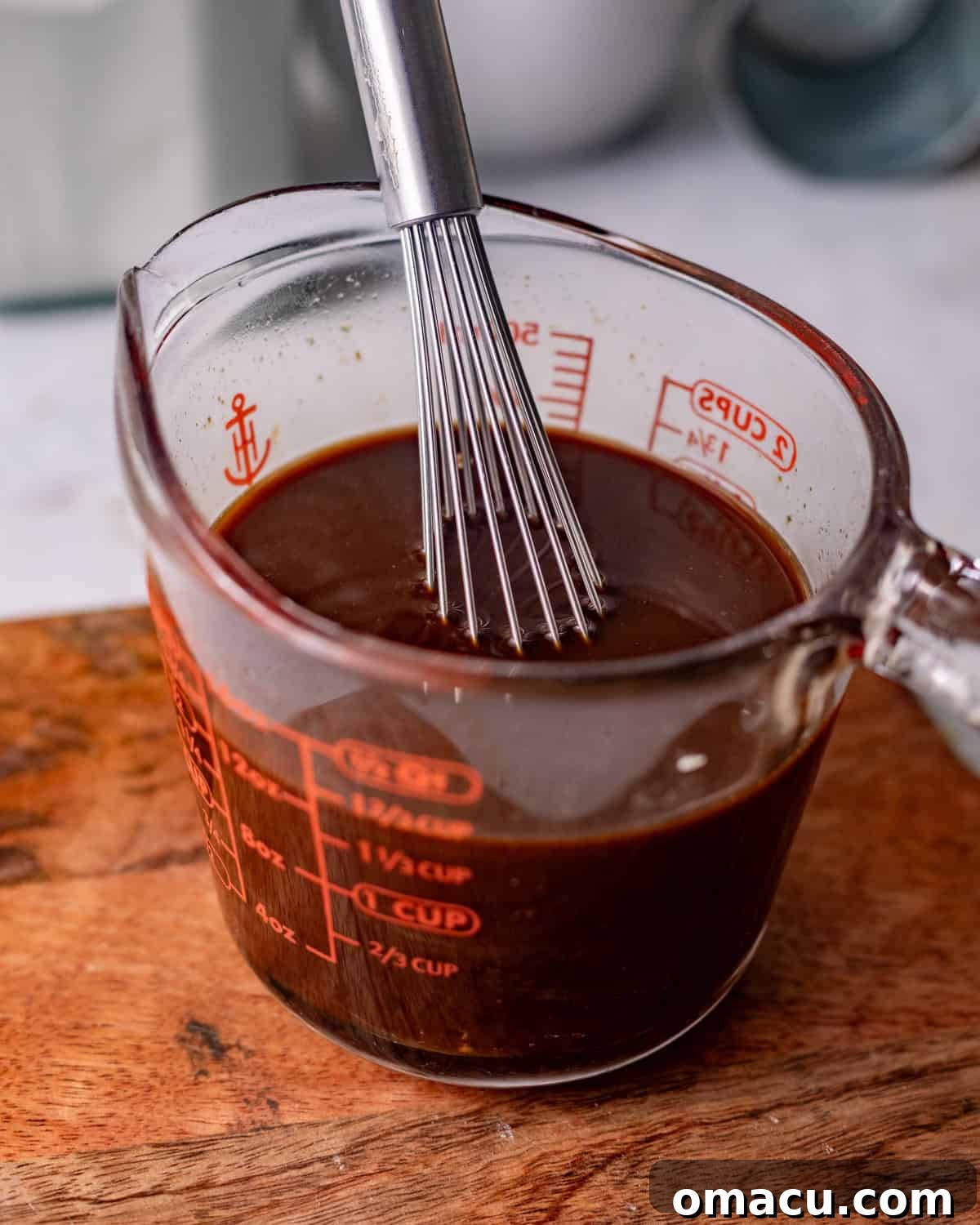 mongolian beef sauce in a measuring cup.