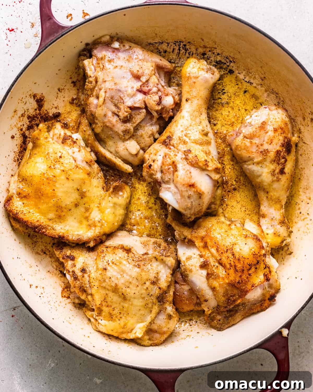 seared chicken in a pot. 