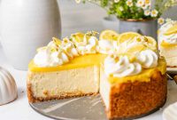 Creamy Lemon Cheesecake Topped with Zesty Lemon Curd