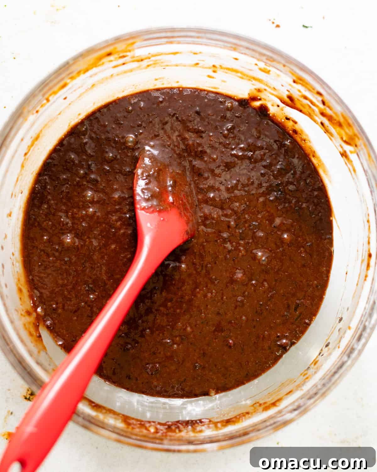 chocolate sticky toffee pudding batter in a bowl. 