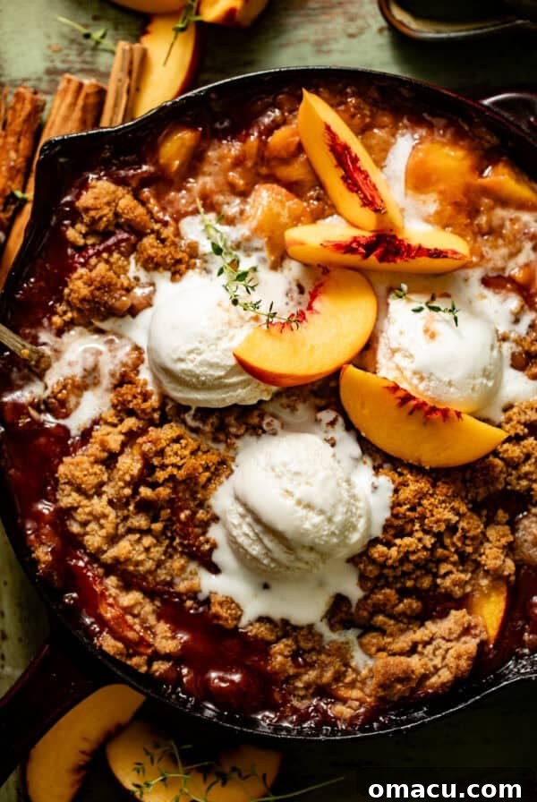 Strawberry Shortcake Recipe: Classic Layer Cake with Fresh Berries 13 peach crumble in a cast iron skillet topped with ice cream.